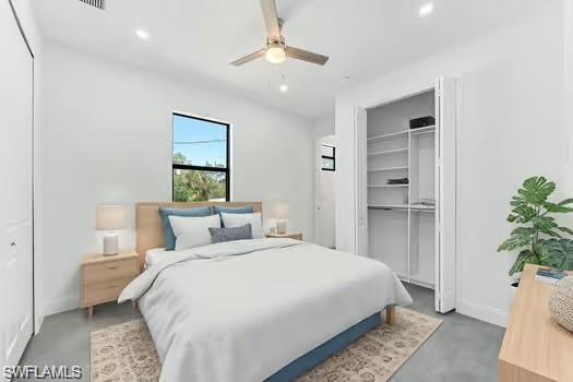 Primary Bedroom (Virtual Staged) on main entrance side featuring concrete floors, recessed lighting, ceiling fan, and a closet