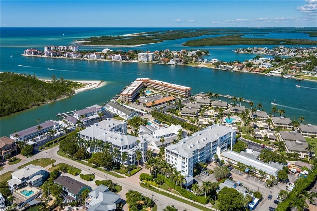 Aerial perspective showcasing coastal properties situated on waterways with direct Gulf access