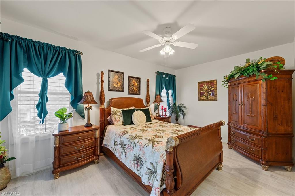 PRIMARY SUITE WITH PLANK TILE AND PLANTATION SHUTTERS