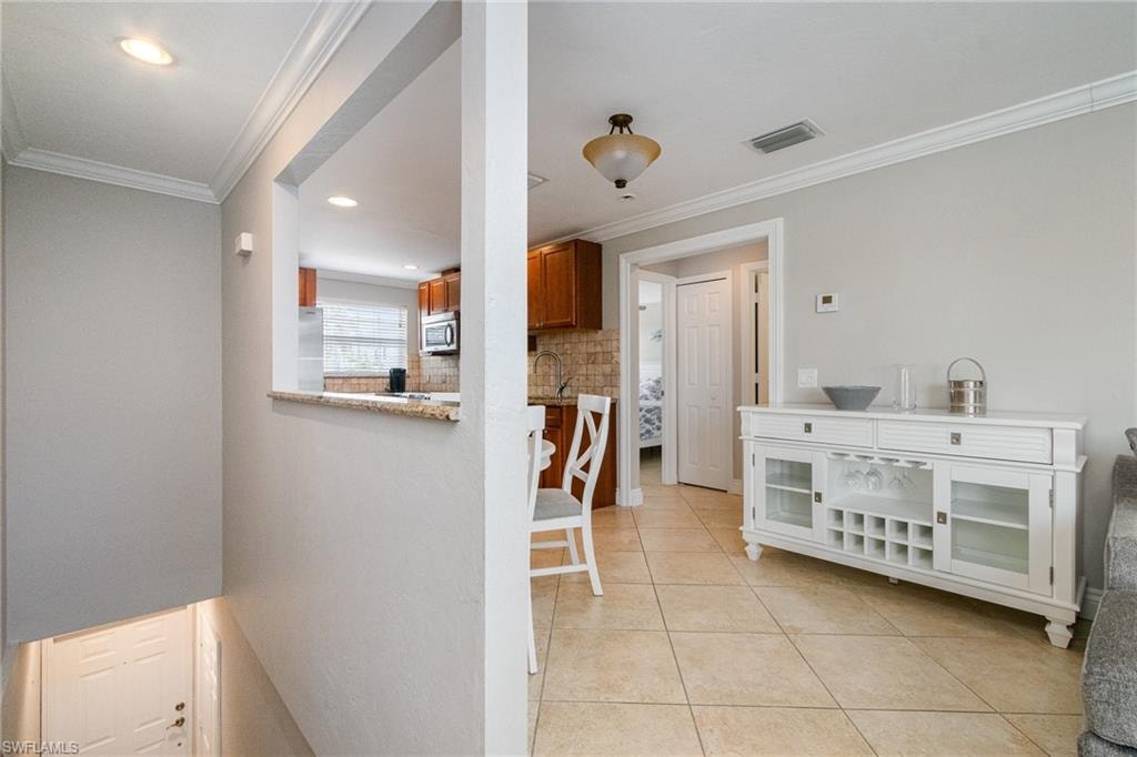 Apt. "B" Staircase into Living & Dining Areas!
