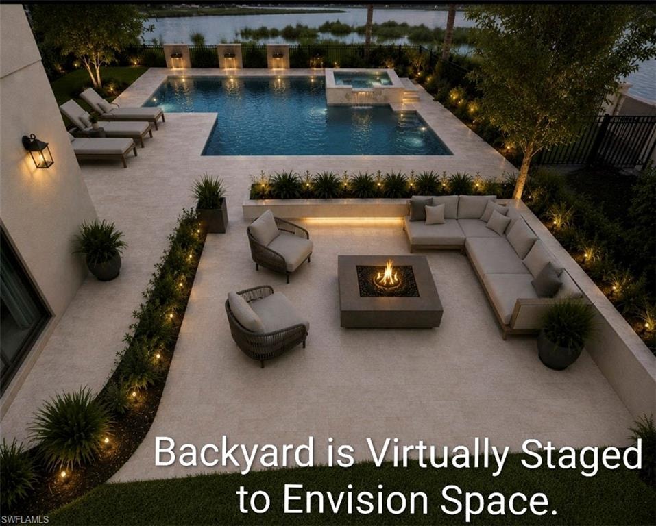 Pool and spa combination, spacious patio area, built-in fire pit, integrated accent lighting, waterside setting