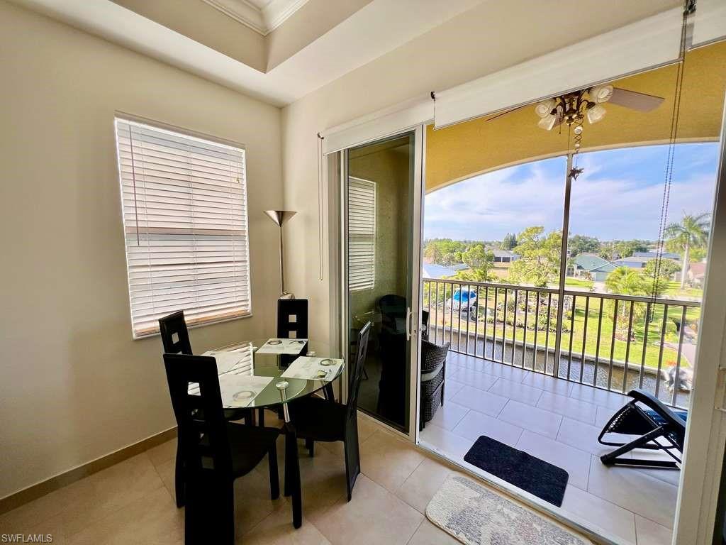 Expansive screened balcony featuring a waterway outlook