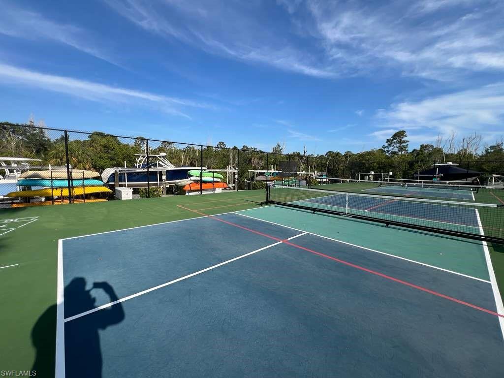 Multiple outdoor pickleball courts with durable surfacing and permanent nets