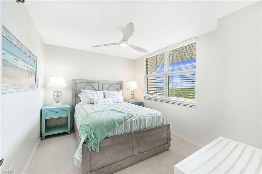 Queen bed in guest bedroom