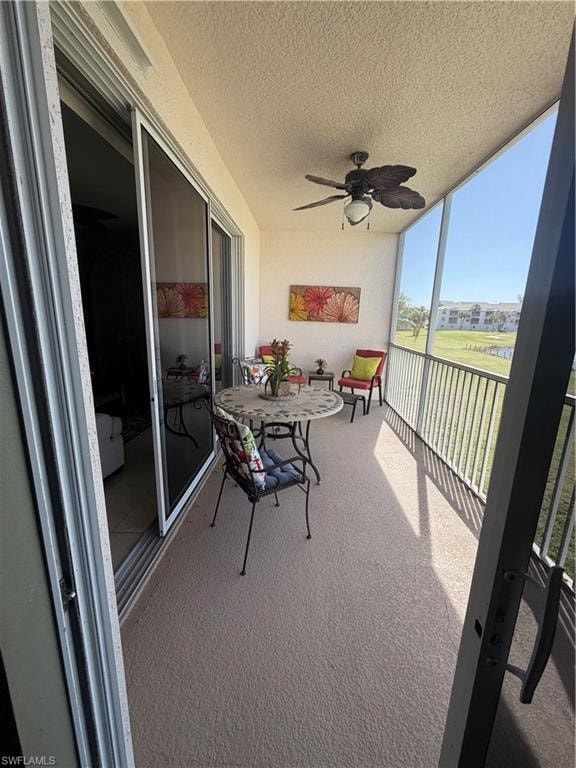Screened balcony with ceiling fan