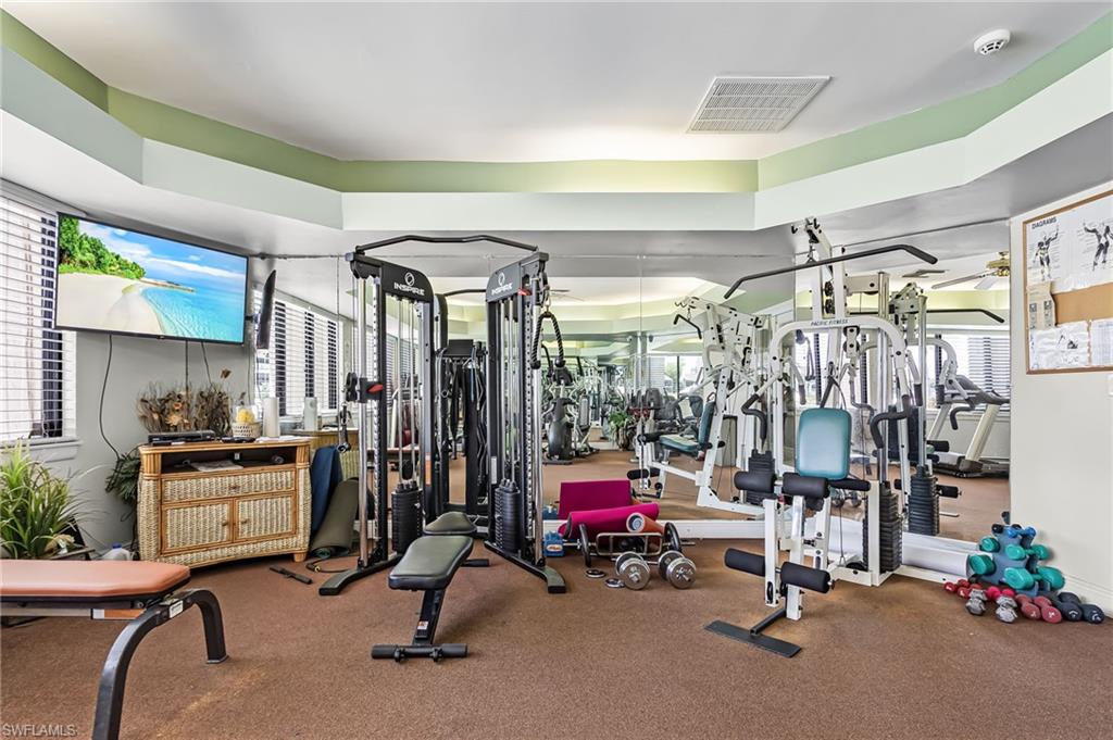 Fitness room with multiple machines and weights