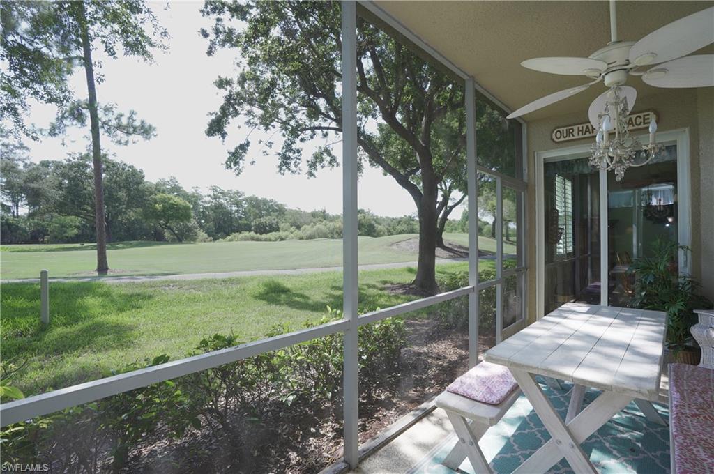 Unfurnished sunroom with ceiling fan