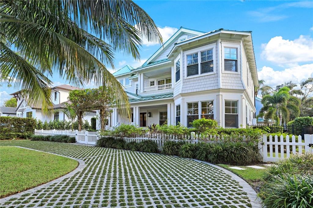 View of front of home featuring a balcony