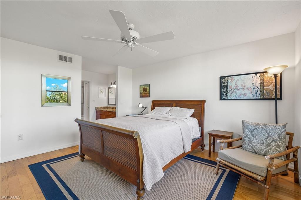 Bedroom featuring light wood-finish flooring and a ceiling fan