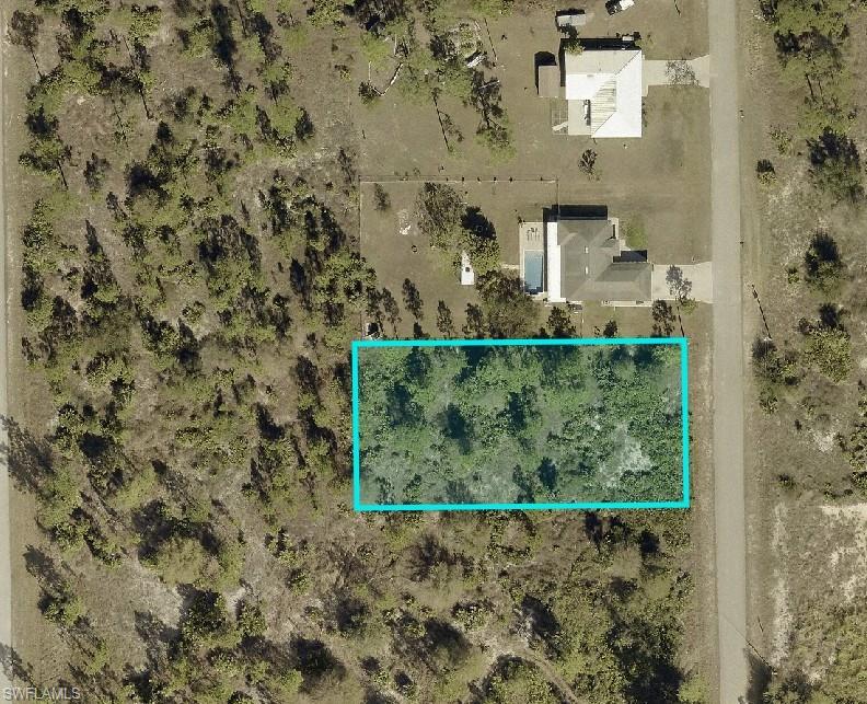 Aerial Property Survey. Outlining the boundaries of the property and its surrounding parcels