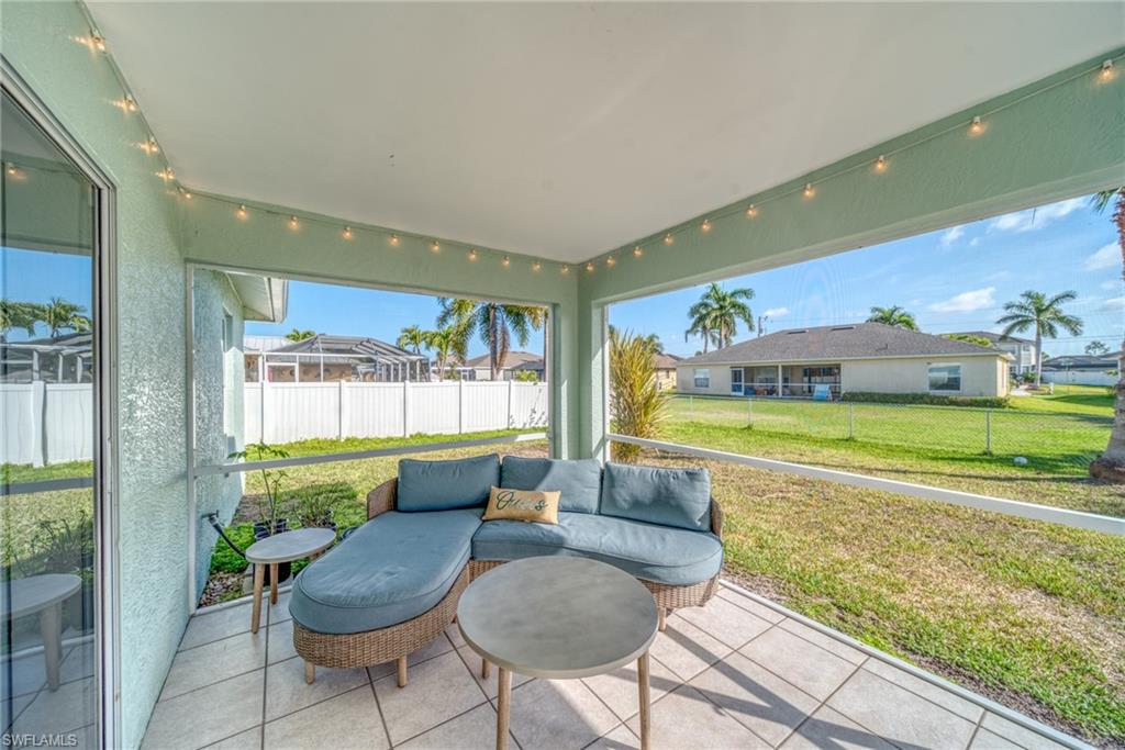 Sunroom featuring an outdoor hangout area