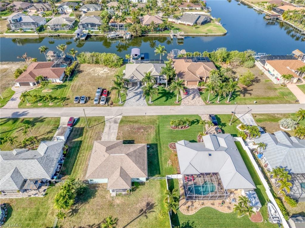 Aerial view of residential area with a large body of water