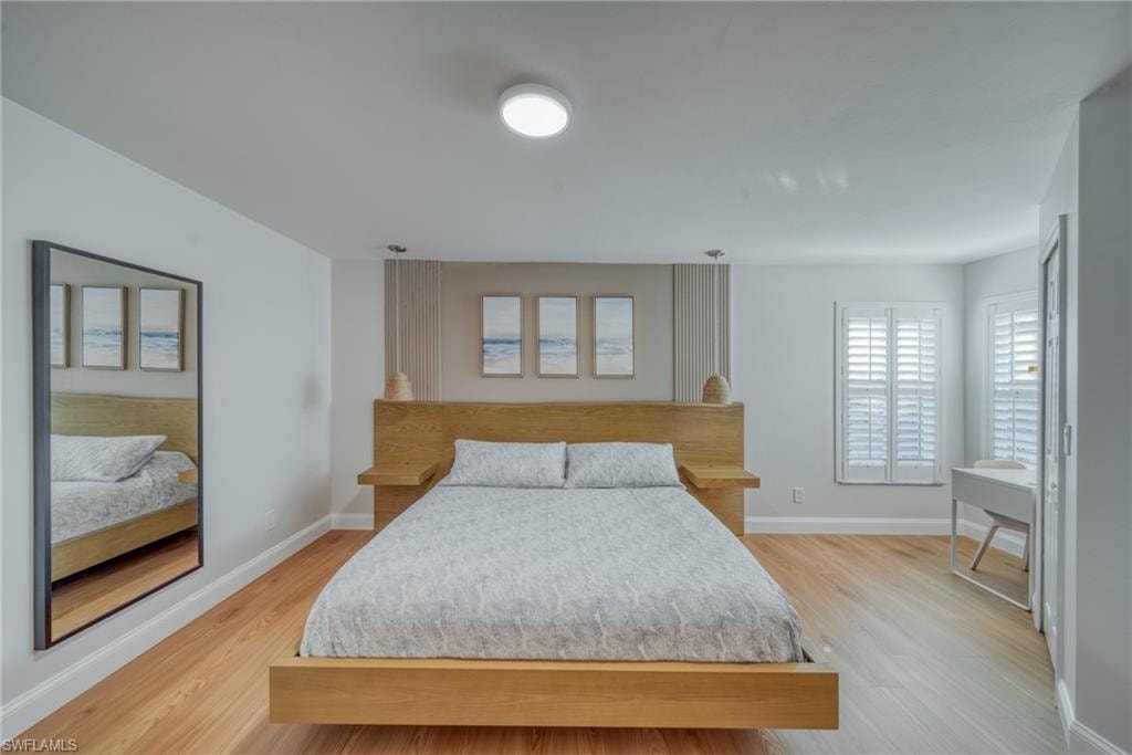 Bedroom featuring light wood-style flooring