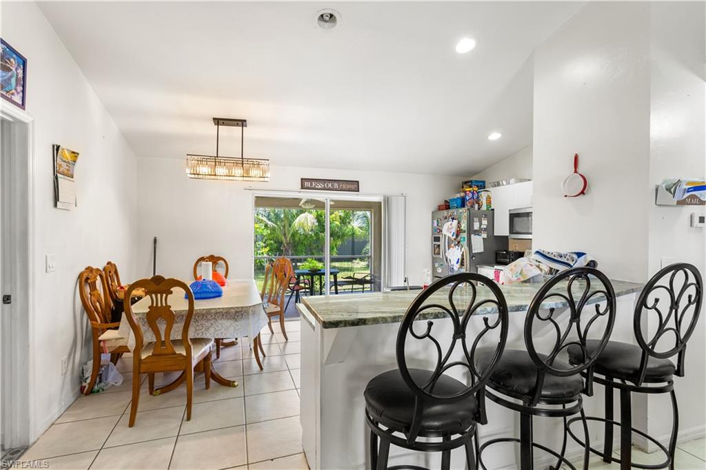 The SPACIOUS KITCHEN is designed withfunction and style in mind, offering plenty ofGRANITE COUNTER SPACE, cabinets, a pantry