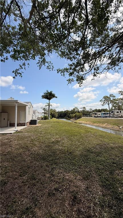 backyard with patio overlooks canal