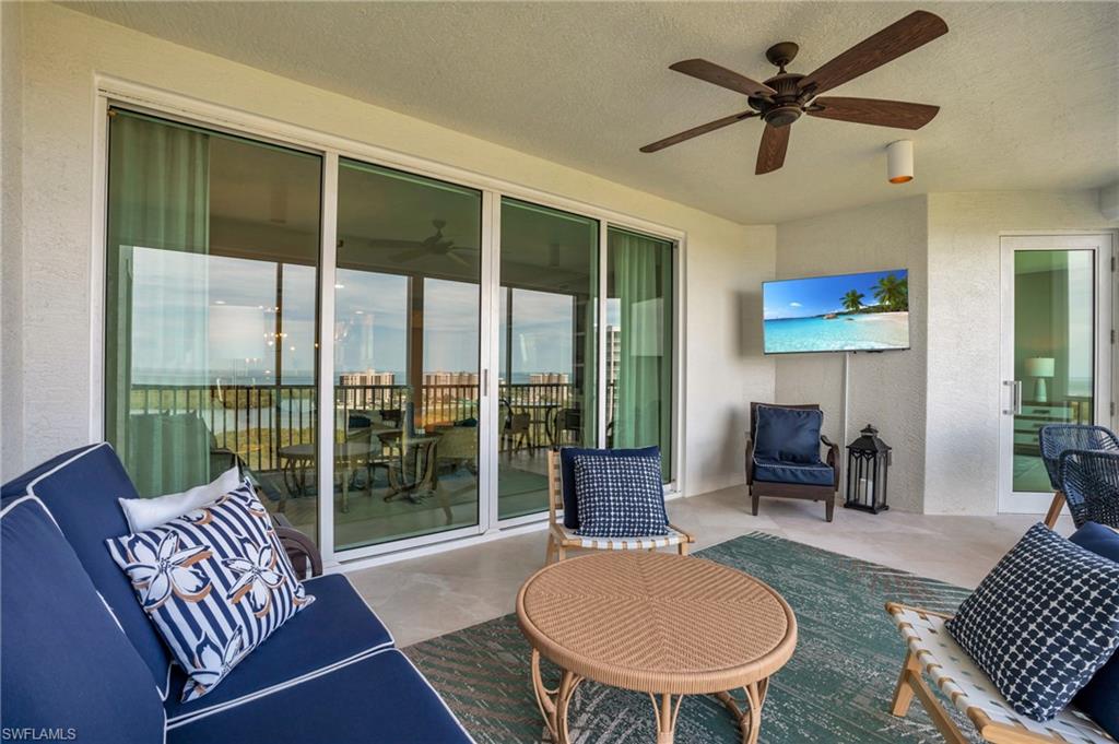 View of terrace featuring ceiling fan