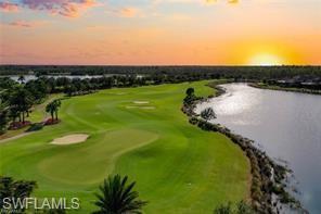 View of community with a water view and golf course view
