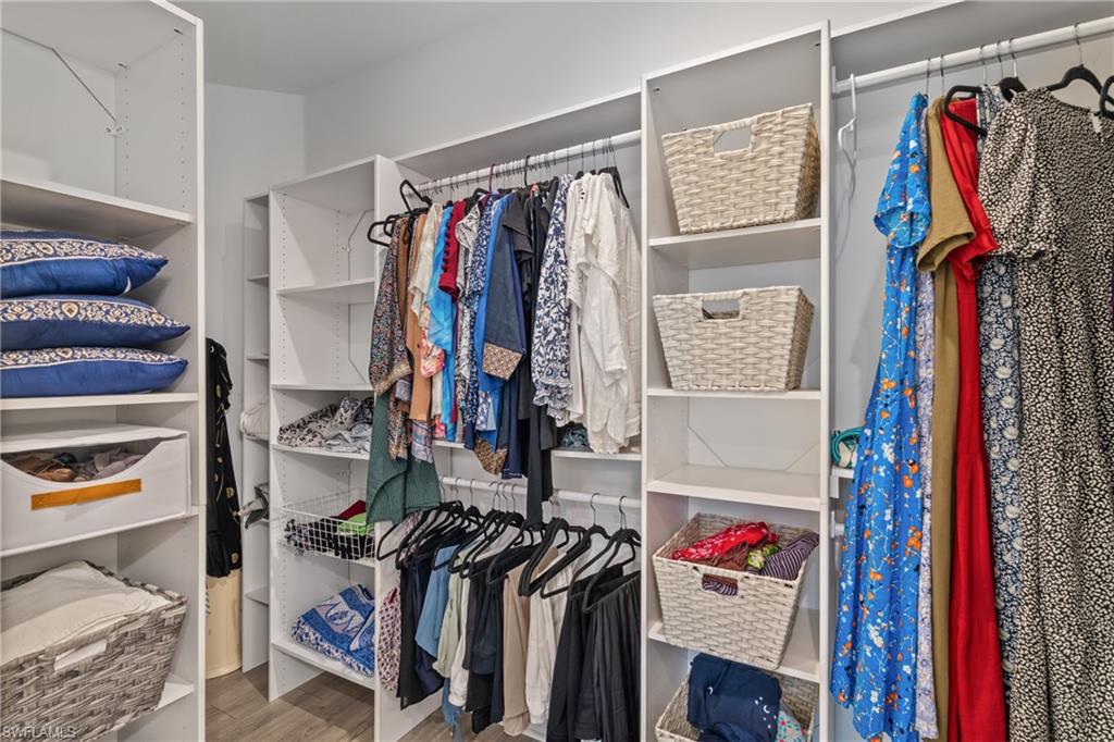 Walk in closet featuring light wood-type flooring
