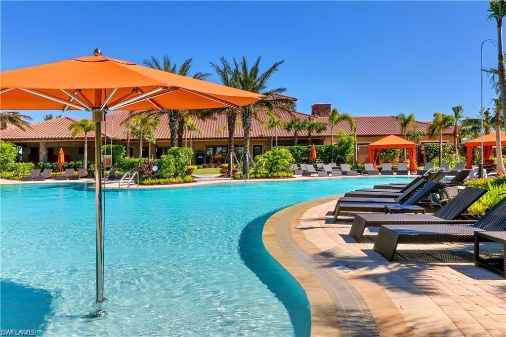 Community pool featuring a patio area and a gazebo