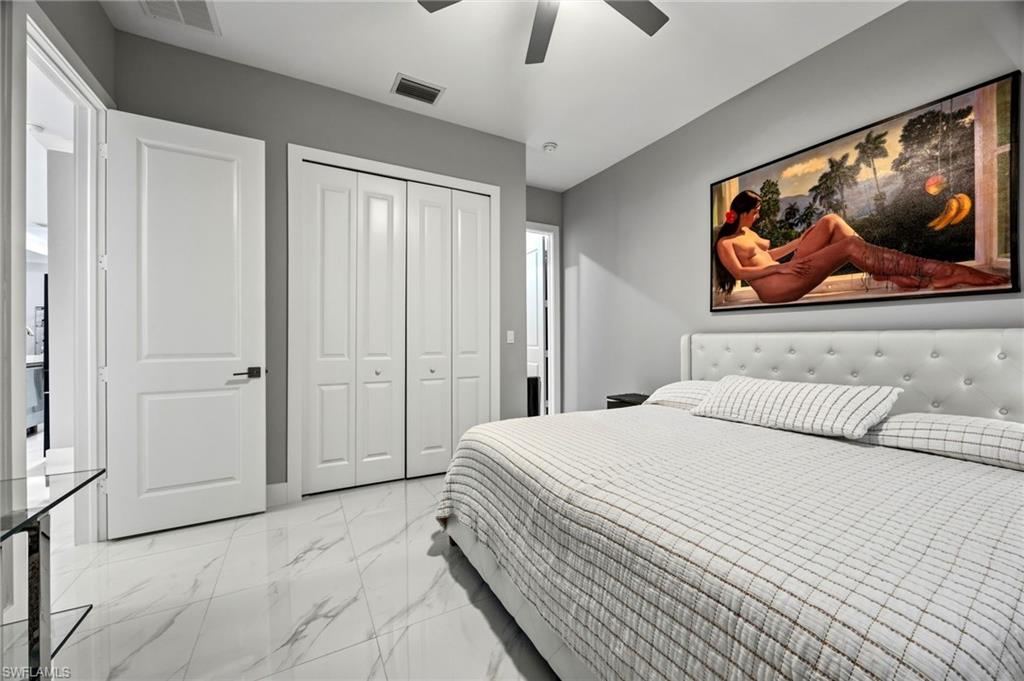 Spacious room featuring white panel doors, and bi-fold closet doors