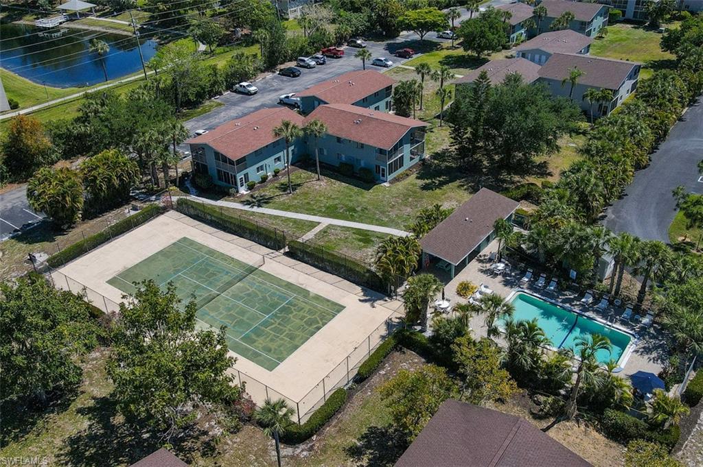 Aerial view of community pool & tennis courts.