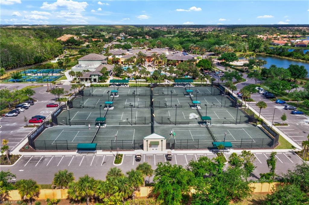 Bright and well-kept tennis courts offering an active lifestyle amenity within the community.