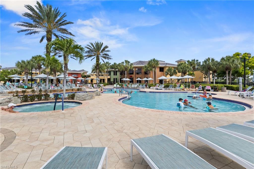 Scenic pool view highlighting the well-maintained community amenities and peaceful Florida atmosphere.