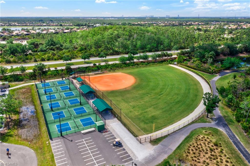 Beautifully kept tennis courts and open baseball field providing residents with multiple options for sports and recreation.