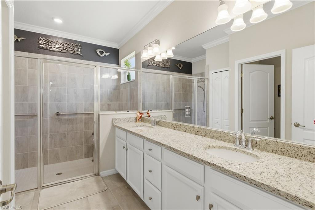 Spa-inspired primary bathroom with dual vanities and a layout designed for comfort and convenience.