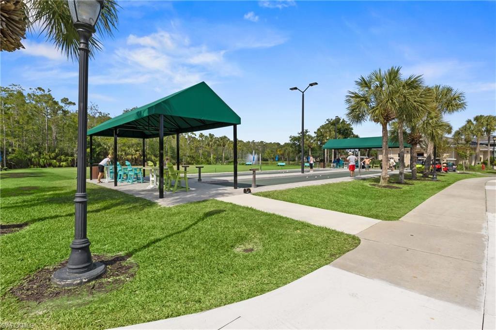 Community shuffleboard courts in Pelican Preserve offering a fun and relaxed space for friendly competition.