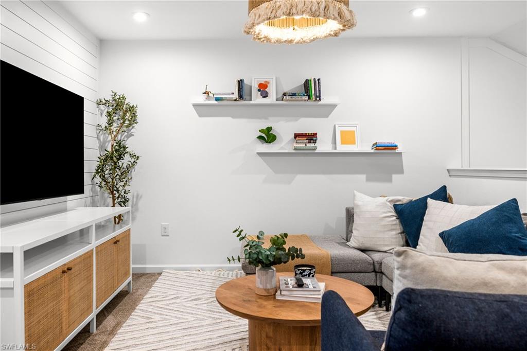 Accent wall featuring horizontal shiplap paneling