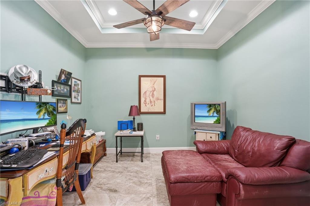 Recessed ceiling with a decorative fan and integrated lighting