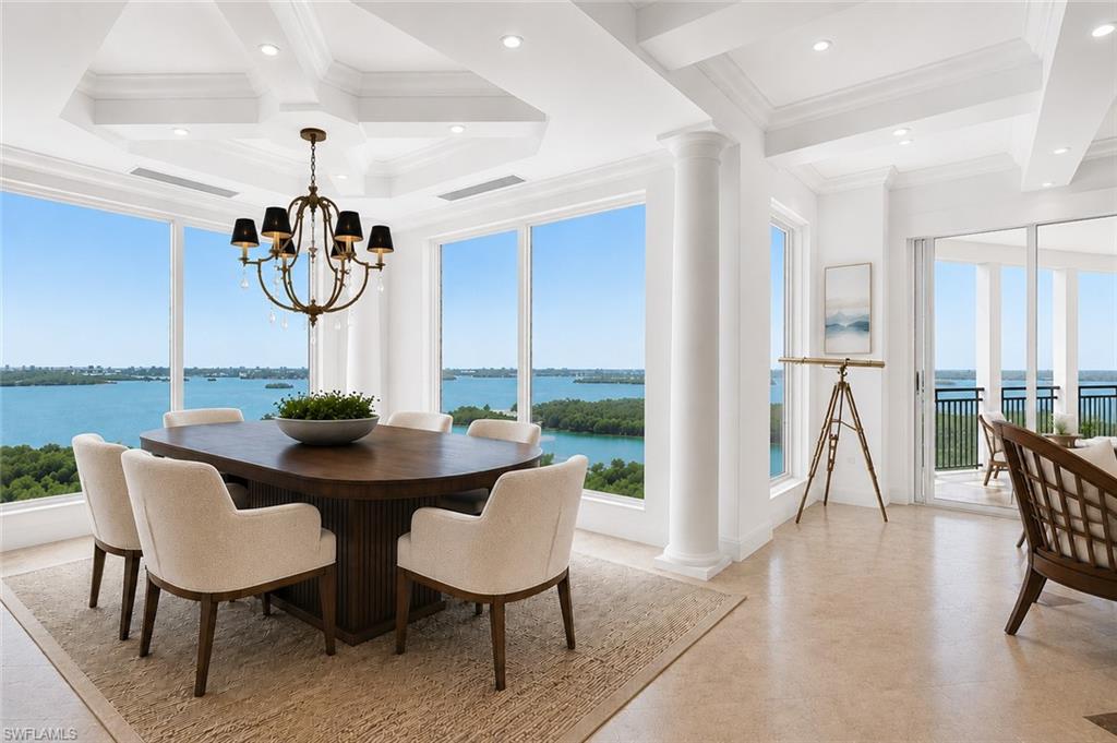 Expansive screened lanai overlooking the Gulf and bay.