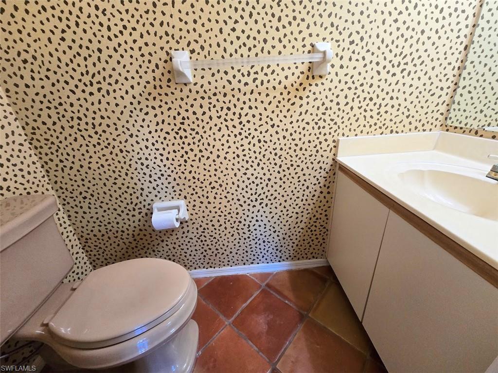 Half Bathroom off of Denw/Vanity & Toilet