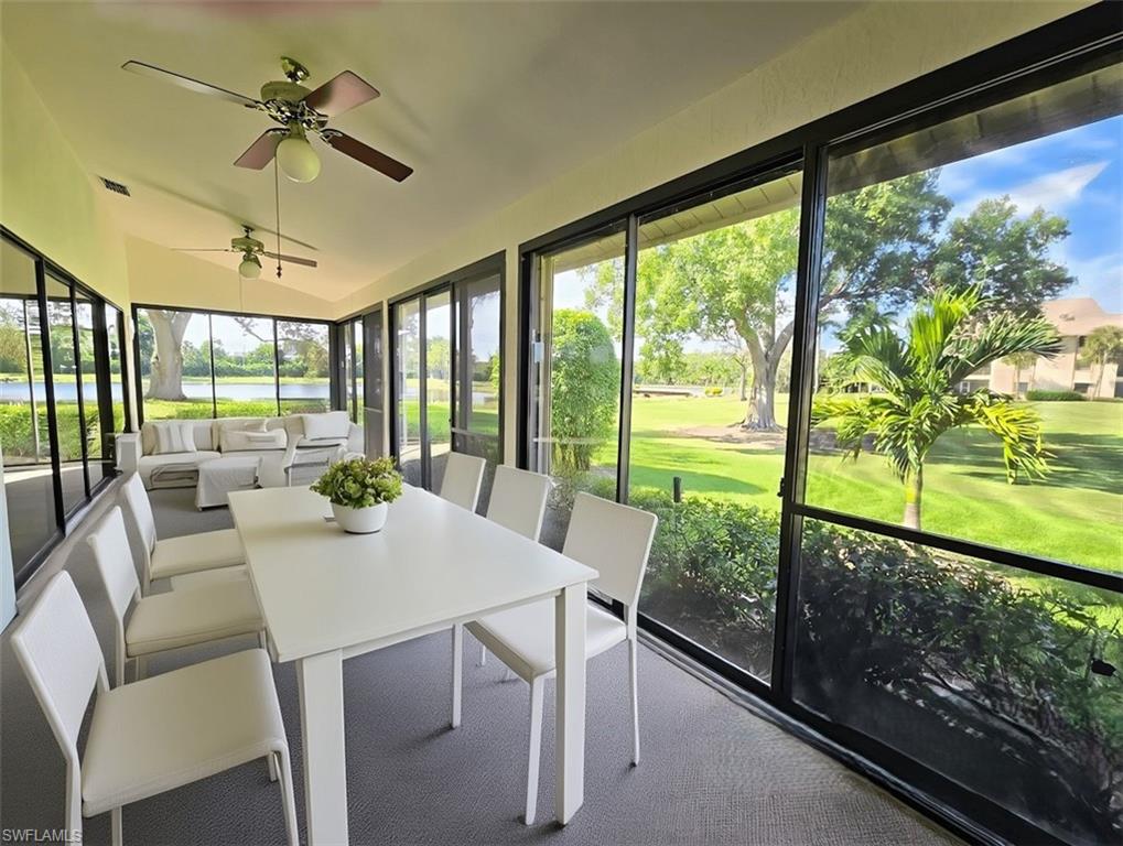 VIRTUALLY STAGED Glass Enclosed Lanai w/View of Lake & Golf Course