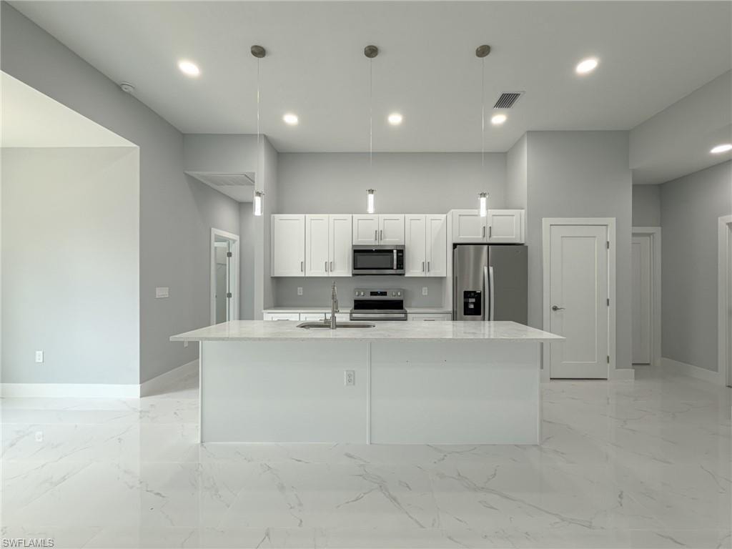 Unfurnished room featuring visible vents, ceiling fan, marble finish floor, and baseboards