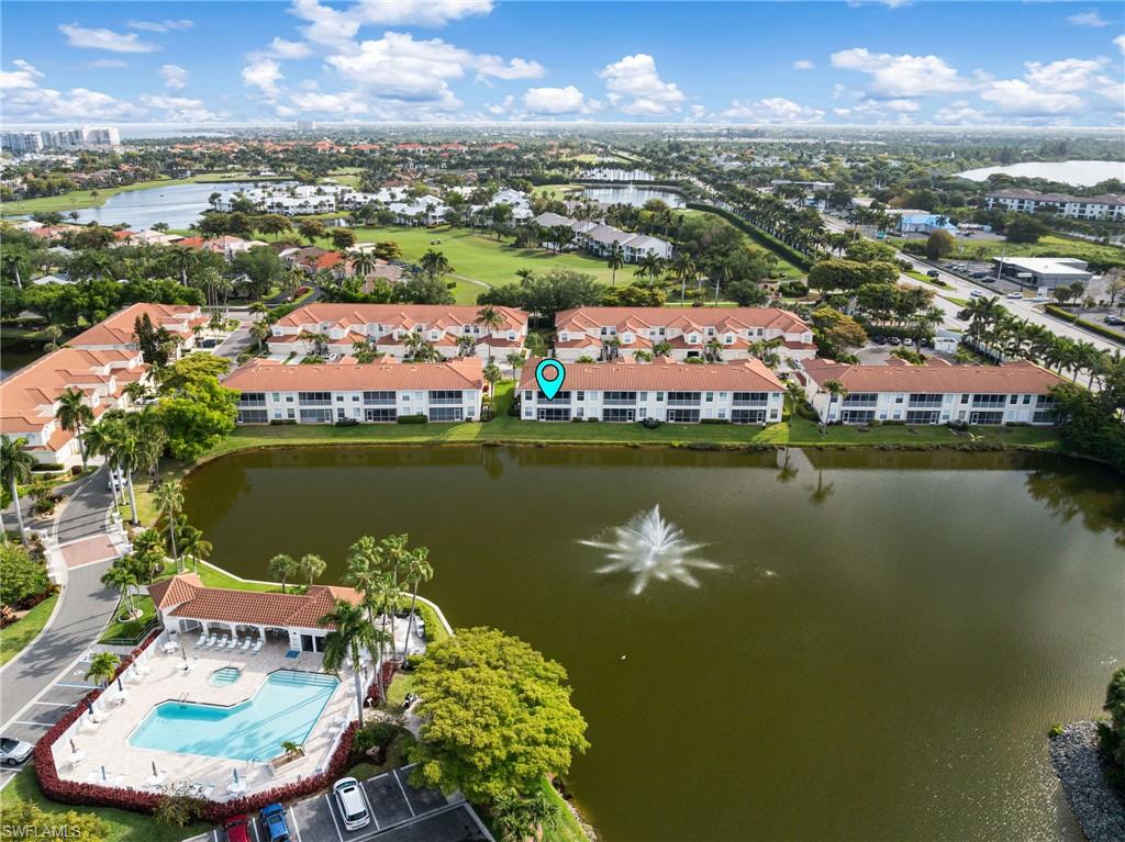 Ideally positioned to capture serene lake and fountain views, this residence also enjoys a short, convenient stroll to the community pool.