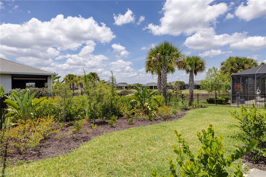 Professional landscaping looks out on lake