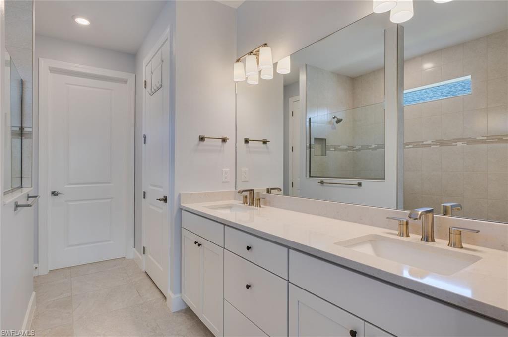 Double sinks. Toilet closet.