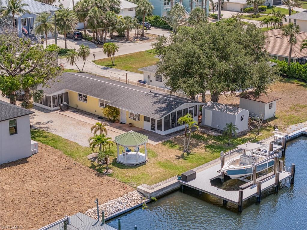 Split into 2 units with screened porches! Dedicated storage shed & Decorative Gazebo!