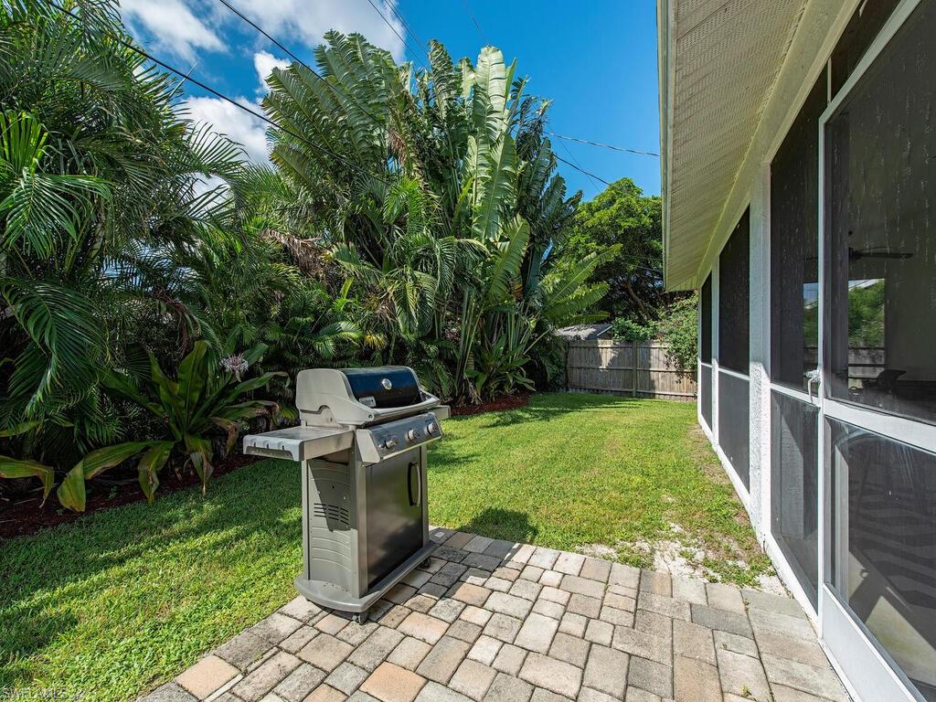 Outside has grill and paver patio area