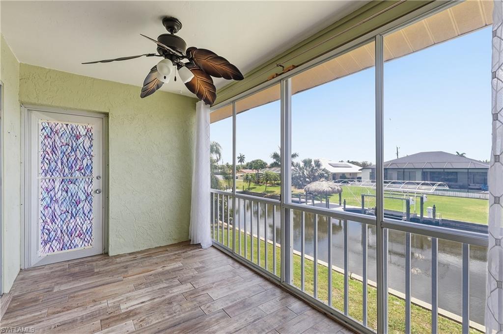 Lanai measures appx 14'x7' and offers backdoor and staircase down to boat dock and pool. Acrylic sliders with screens on canal side open/close to allow all season use.