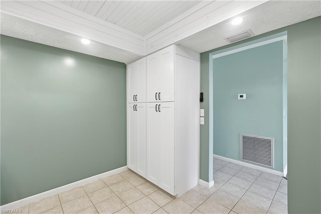 Stand-alone pantry provides lots of storage in the kitchen.