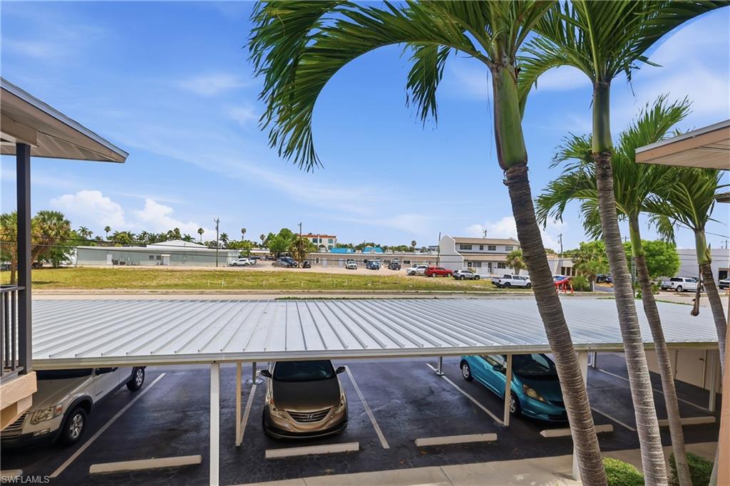 View from front door looking north across the parking lot to the neighbors...burrowing owls! Cape Coral Pkwy is 2 blocks north.
