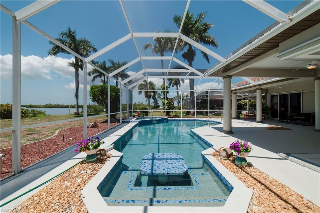 Pool with eat in table.