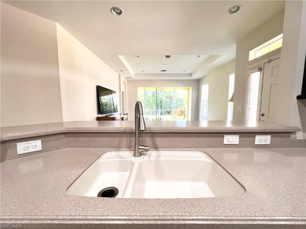 Corian Countertops & Updated Fixture/Disposal