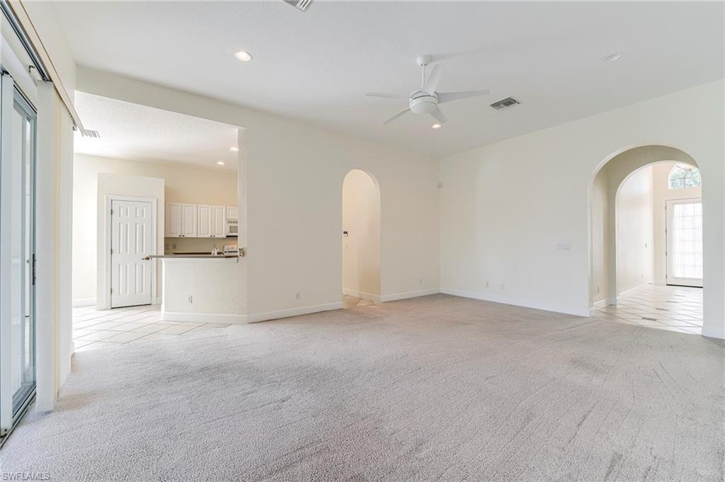 Family room.  Hall on right to den, guest bedroom and entry