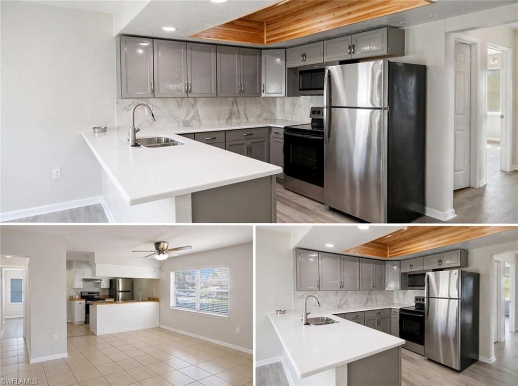 Contemporary kitchen featuring grey cabinetry, stainless steel appliances, white countertops, and a marble-patterned backsplash