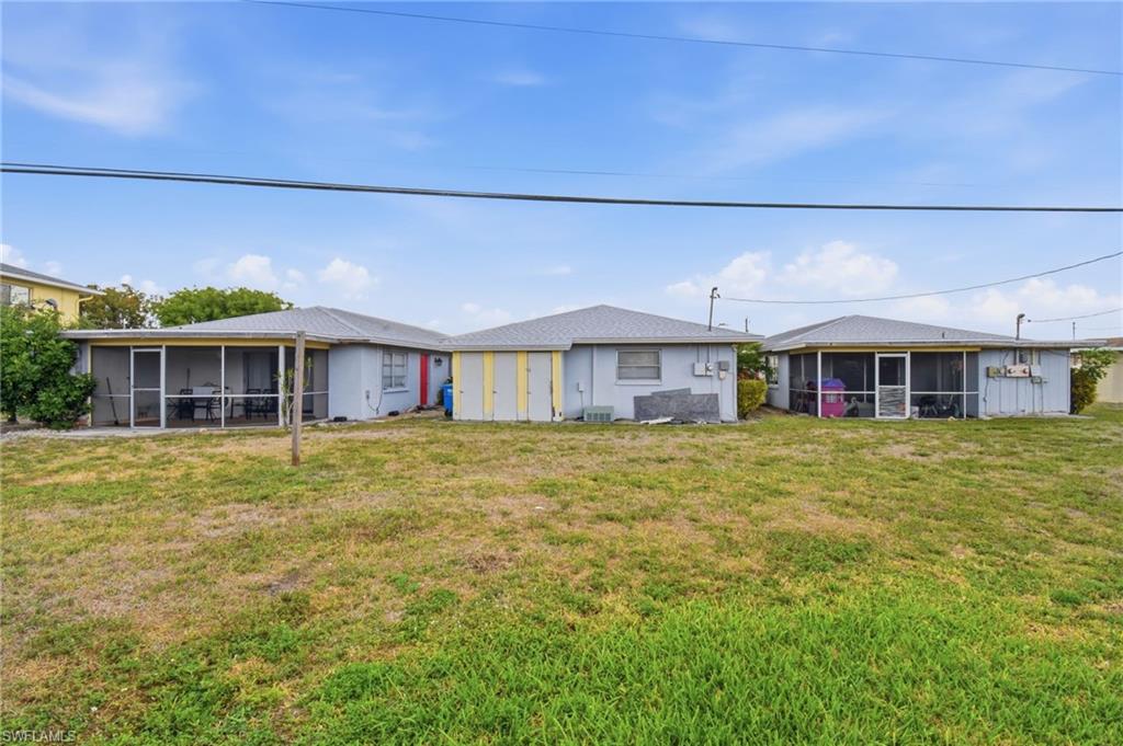 Three single-story structures featuring light-colored exteriors and screened-in rear patios