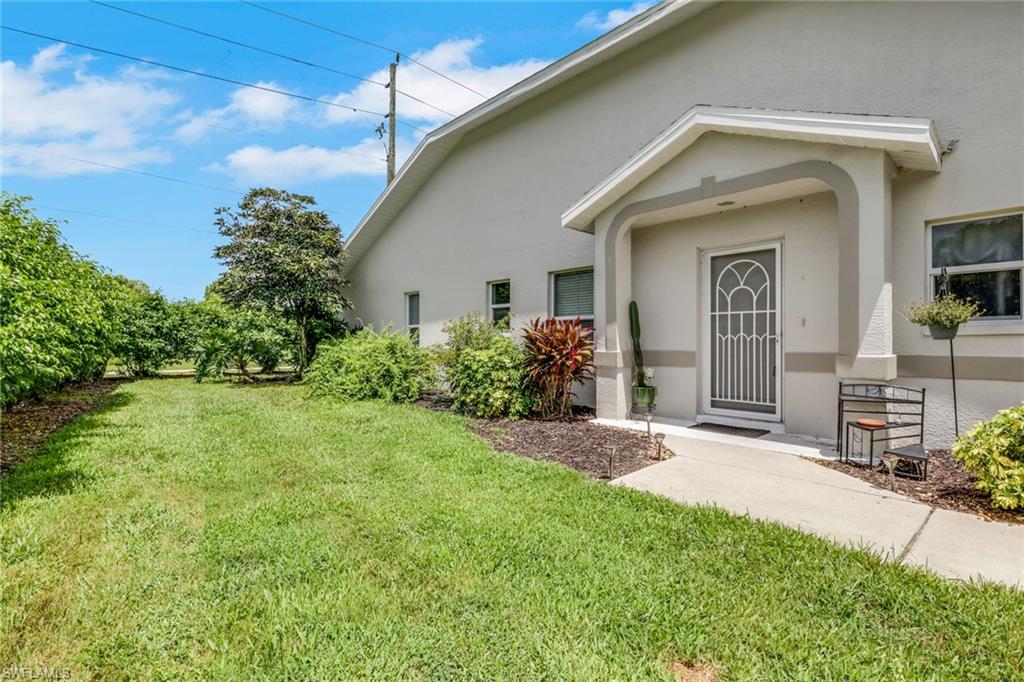 Private entry with a spacious side yard.